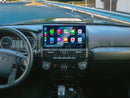 Dashboard of a Toyota 4Runner with the Hamilton Motor Company Premium Conversion Kit installed and CarPlay displayed on the screen.