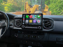 Dashboard of a Toyota Tacoma with Hamilton Motor Company Conversion Kit installed and the screen showing Apple CarPlay