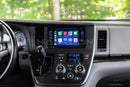 A dashboard of a Toyota Sienna with the Hamilton Motor Company Conversion Kit installed and Apple CarPlay displayed on the screen. 
