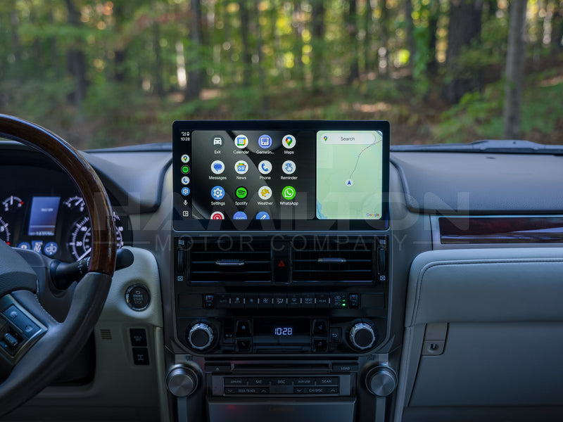 A dashboard of a 2010 - 2013 Lexus GX with the Hamilton Motor Company Conversion Kit installed and Android Auto displayed on the screen. 