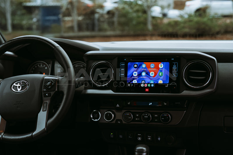 Dashboard of a Toyota Tacoma with Hamilton Motor Company Upgrade Kit installed and the screen showing Android Auto