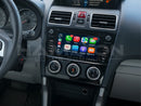 Dashboard of a Subaru Forester with the Hamilton Motor Company upgrade kit installed and the screen showing Apple CarPlay