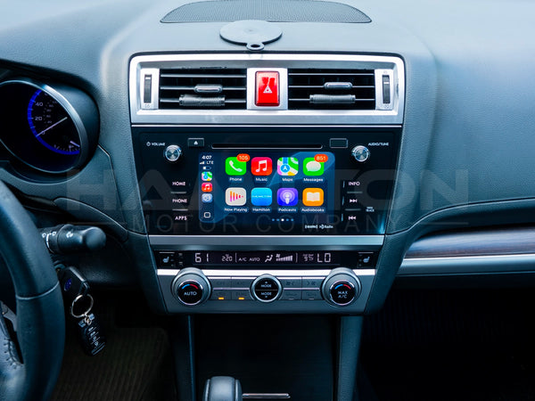 Dashboard of a Subaru Legacy with Hamilton Motor Company Upgrade Kit installed and screen showing Apple CarPlay
